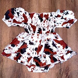 Cow print baby dress